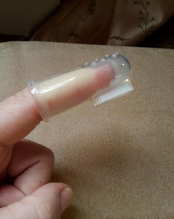 Зубная щетка на палец Happy Baby Tooth Care фото