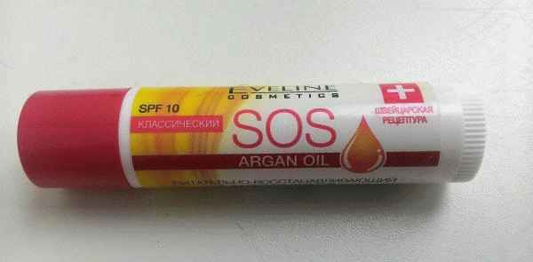 Питательно-восстанавливающий бальзам для губ Eveline SOS Argan Oil фото
