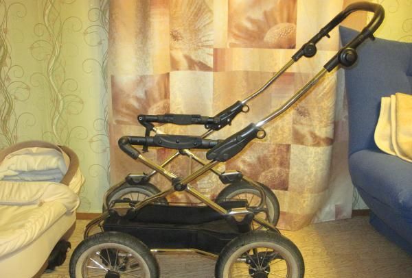 Универсальная детская коляска Deltim Navington Caravel 2 в 1 фото