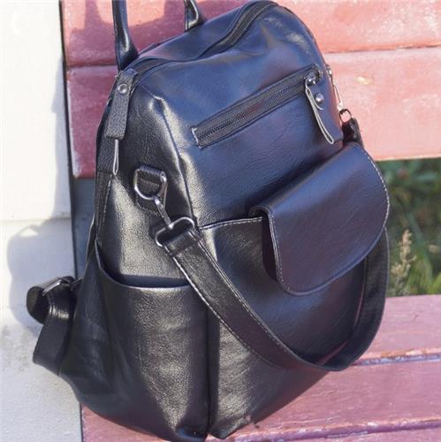 Стильный молодежный черный рюкзак из PU кожи. фото